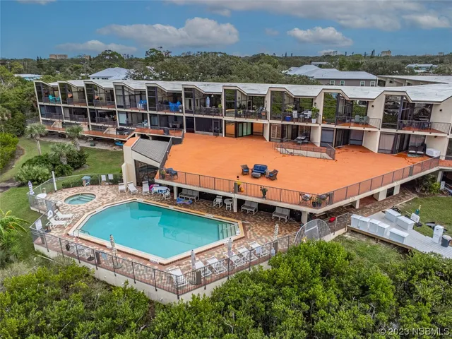 a view of a chairs and table in a room