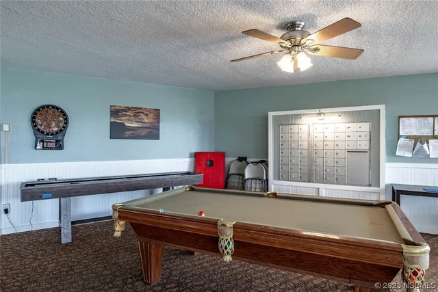 a view of a balcony with outdoor seating