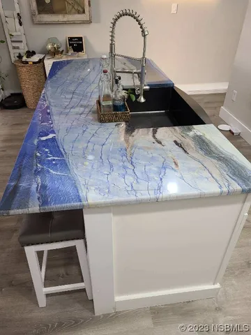 a view of a patio with chair and table on the terrace