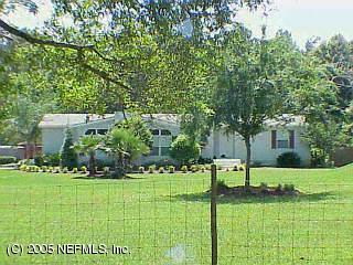 1376 Marlee Road Jacksonville, FL 32259 - Photo 1 of 1 a view of a house with a big yard