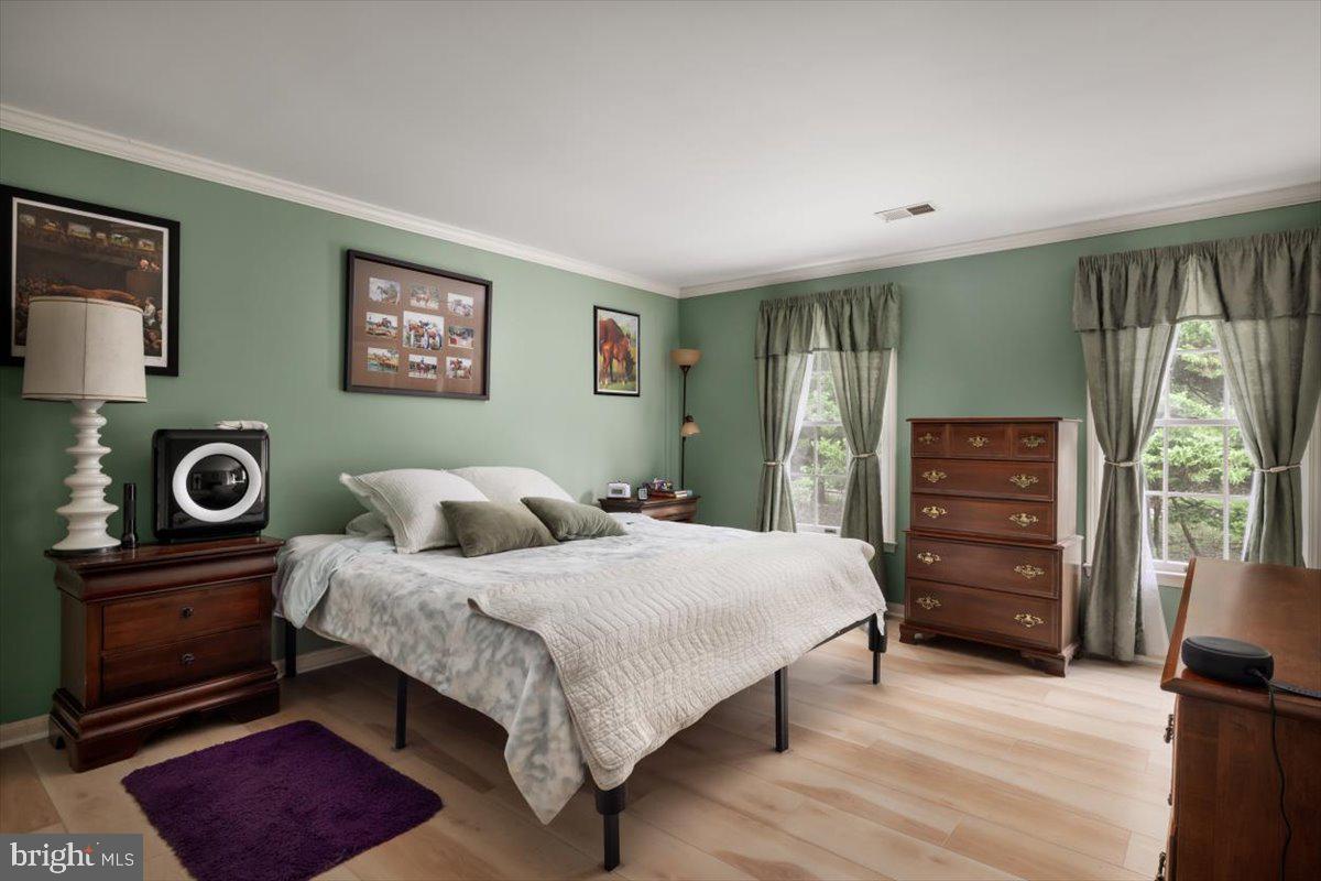 19606 Ridgeside Road Bluemont, VA 20135 - Photo 33 of 81 a bedroom with a bed and a dresser in it