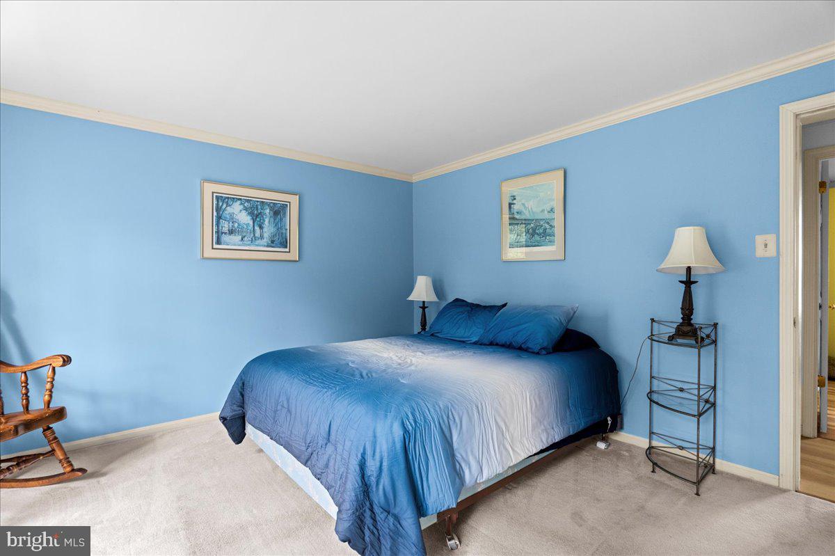 19606 Ridgeside Road Bluemont, VA 20135 - Photo 37 of 74 a bedroom with a bed and a table