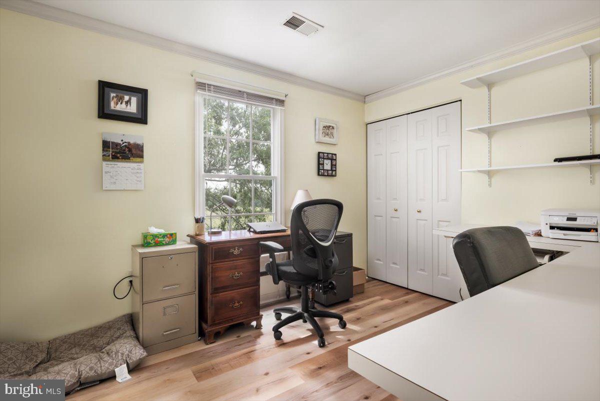 19606 Ridgeside Road Bluemont, VA 20135 - Photo 39 of 81 a view of a workspace with furniture and a window