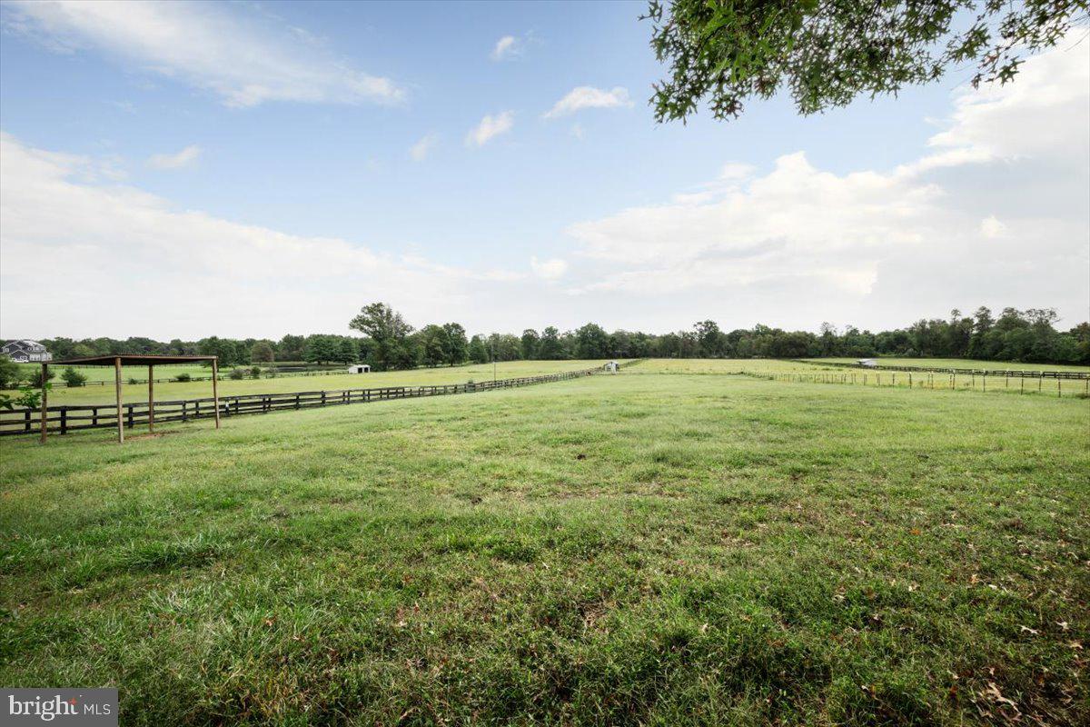 19606 Ridgeside Road Bluemont, VA 20135 - Photo 49 of 81 a view of a lake with houses in the back