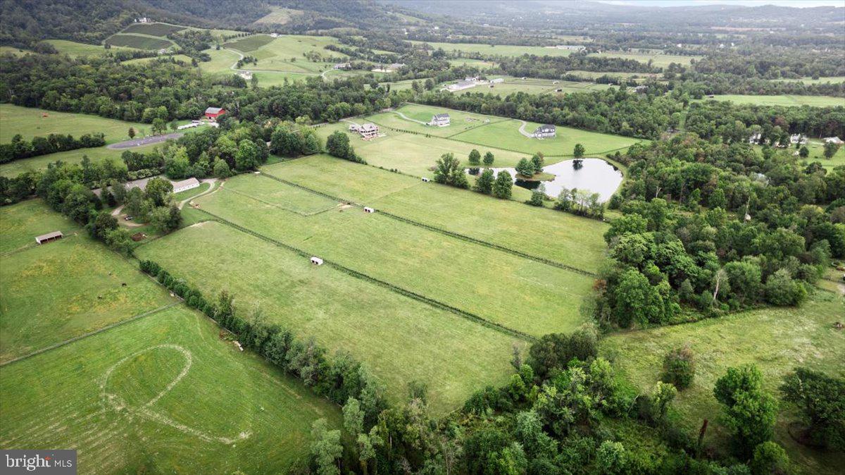 19606 Ridgeside Road Bluemont, VA 20135 - Photo 53 of 81 an aerial view of residential houses with outdoor space and trees
