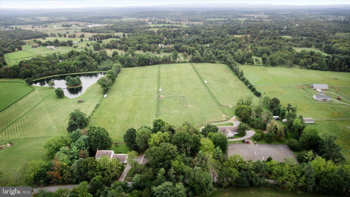 19606 Ridgeside Road Bluemont, VA 20135 - Photo 6 of 81 an aerial view of residential houses with outdoor space and trees