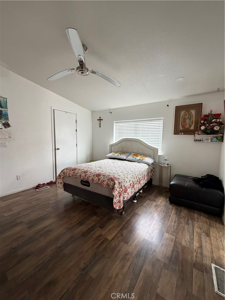 20401 Soledad Canyon Road, Unit 406 Canyon Country, CA 91351 - Photo 11 of 16 a bedroom with a bed and a couch