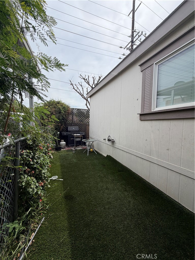 20401 Soledad Canyon Road, Unit 406 Canyon Country, CA 91351 - Photo 3 of 16 a view of a backyard of the house