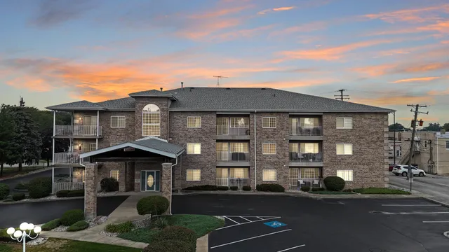 a front view of a house with yard