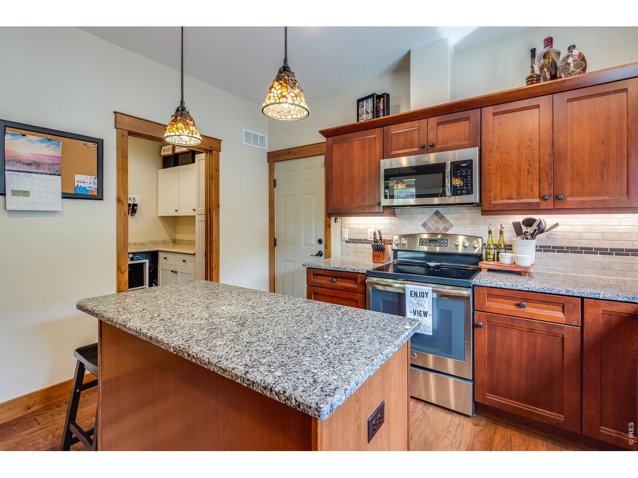 2209 Fish Creek Road Estes Park, CO 80517 - Photo 16 of 50 Stunning kitchen featuring seamless access to the laundry room and garage.