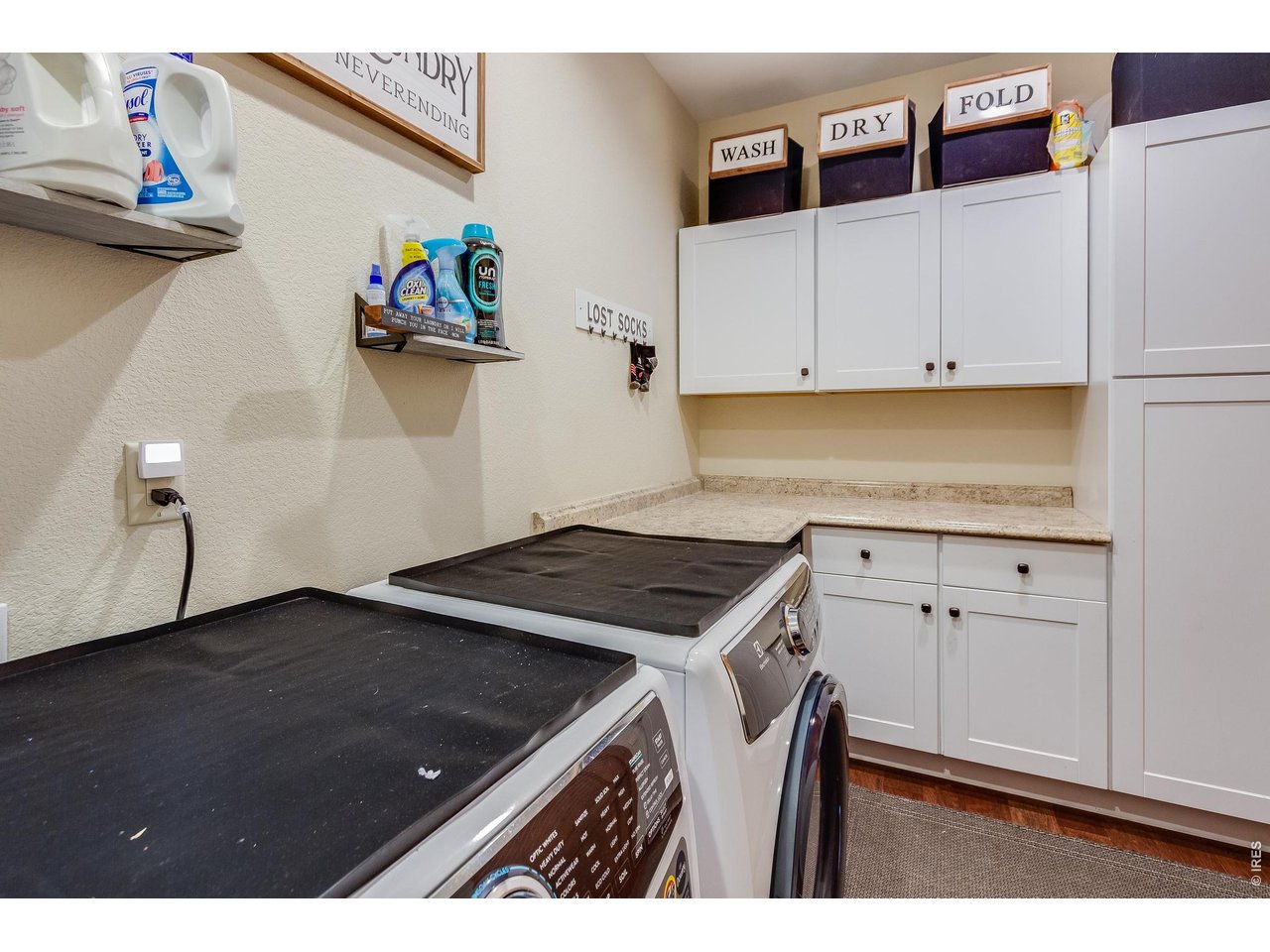 2209 Fish Creek Road Estes Park, CO 80517 - Photo 19 of 50 Large, organized laundry and mudroom area with built-in storage.