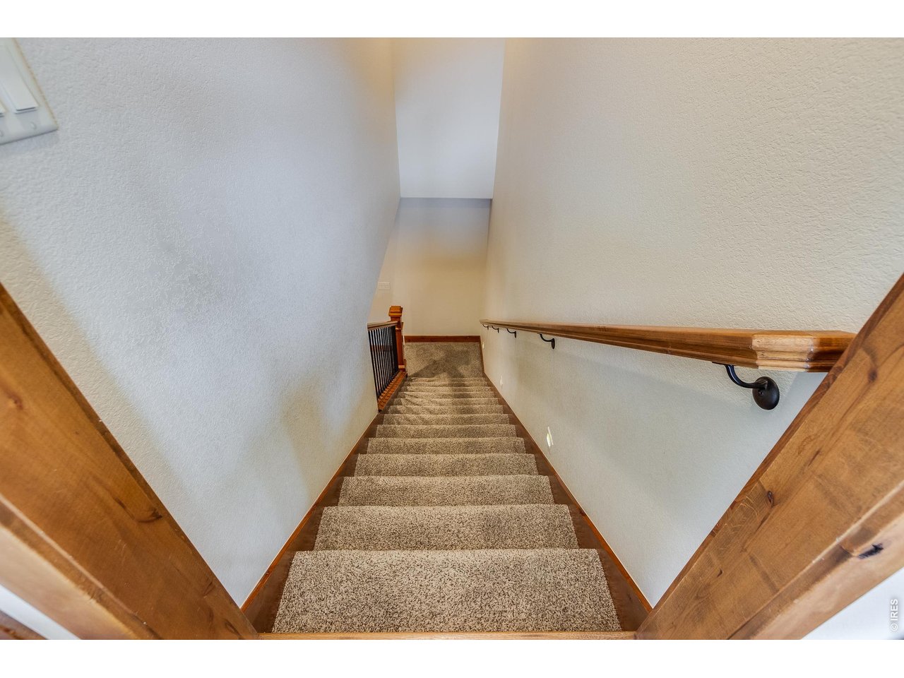 2209 Fish Creek Road Estes Park, CO 80517 - Photo 25 of 50 Staircase to lower level