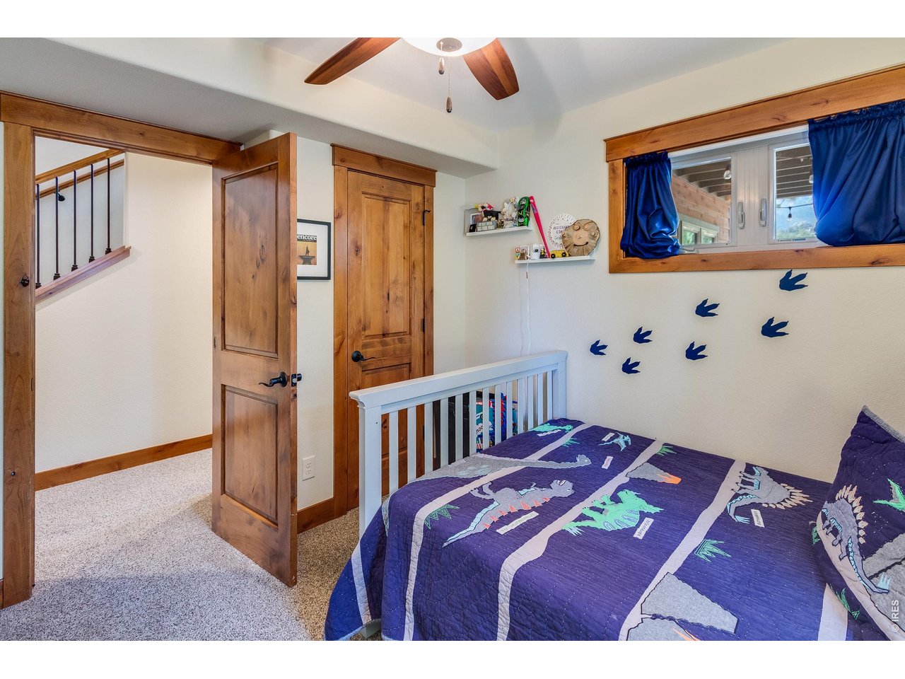 2209 Fish Creek Road Estes Park, CO 80517 - Photo 31 of 50 Bright third bedroom featuring a large closet for ample storage.