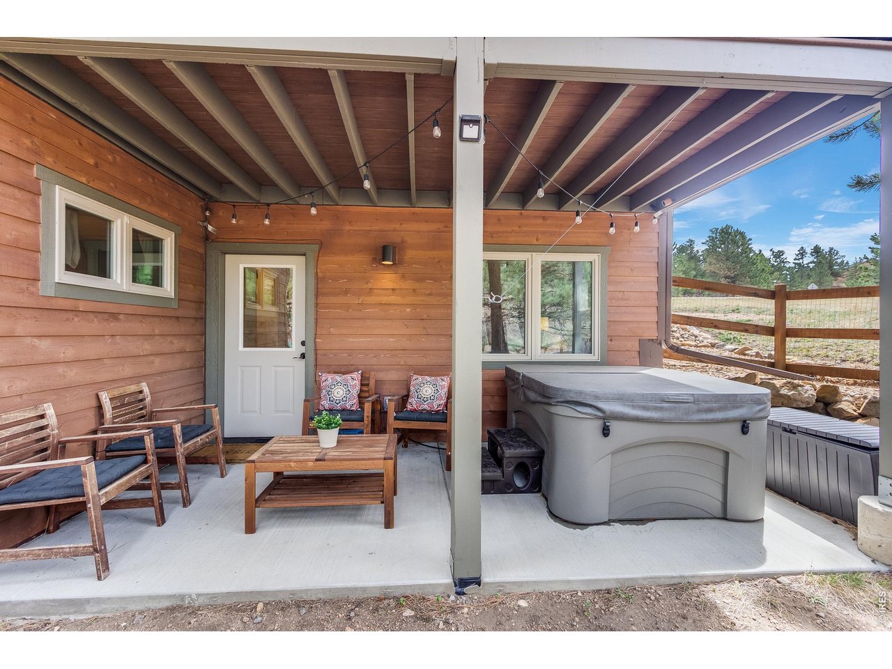 2209 Fish Creek Road Estes Park, CO 80517 - Photo 41 of 50 Enjoy mountain relaxation under the covered patio.