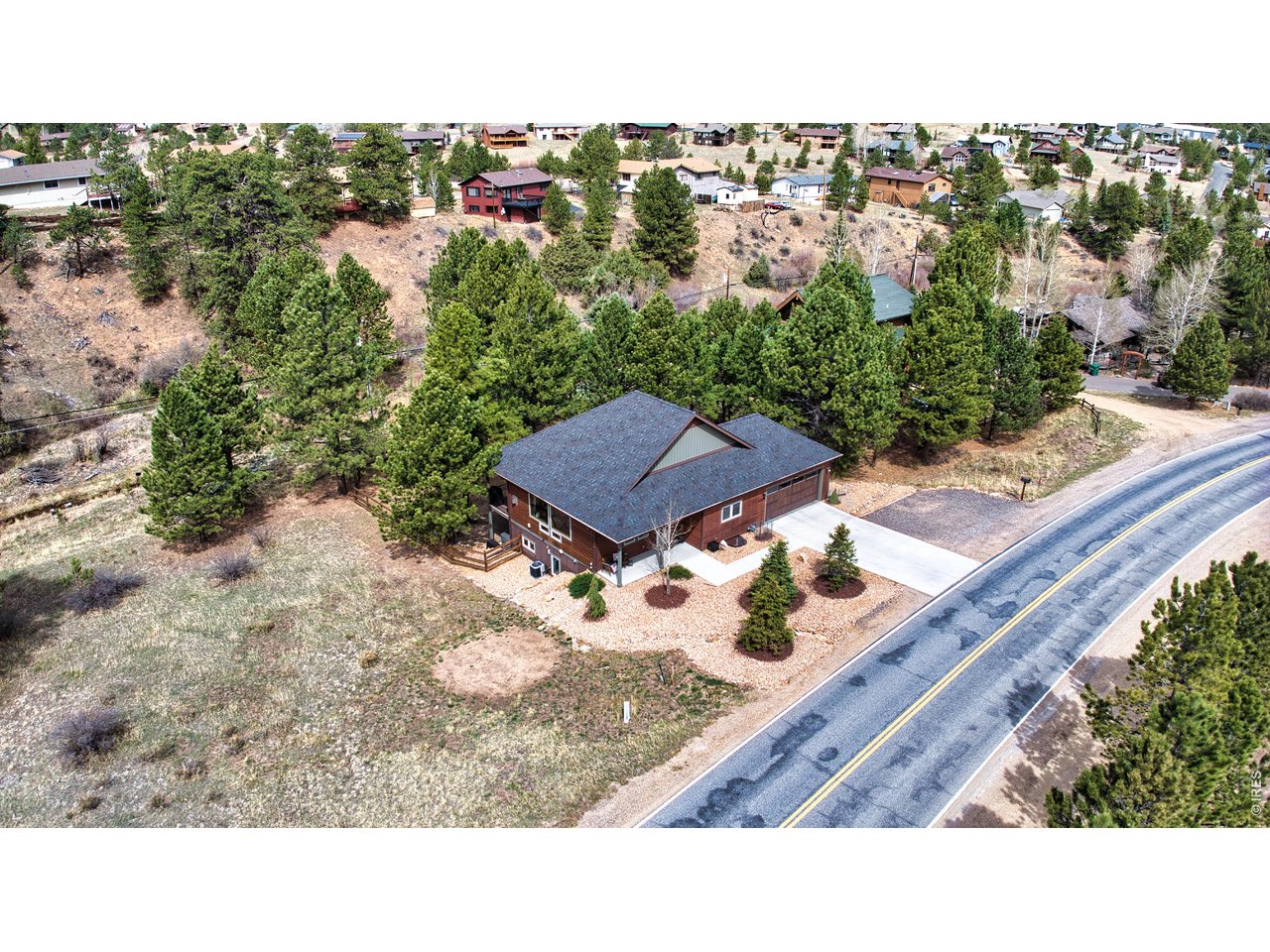 2209 Fish Creek Road Estes Park, CO 80517 - Photo 47 of 50 Aerial view showcasing the expansive lot, surrounding pines, and easy access to Fish Creek Rd.