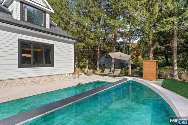 a backyard of a house with seating space