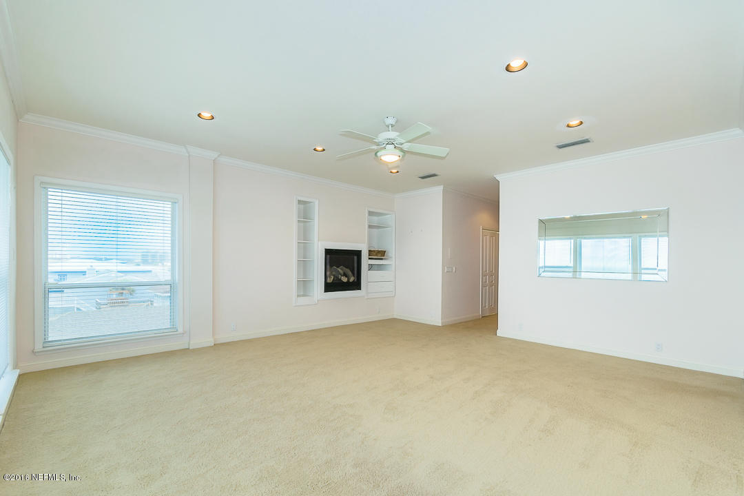 1626 Strand Street Neptune Beach, FL 32266 - Photo 19 of 51 a view of an empty room with a window