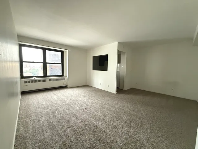 an empty room with windows