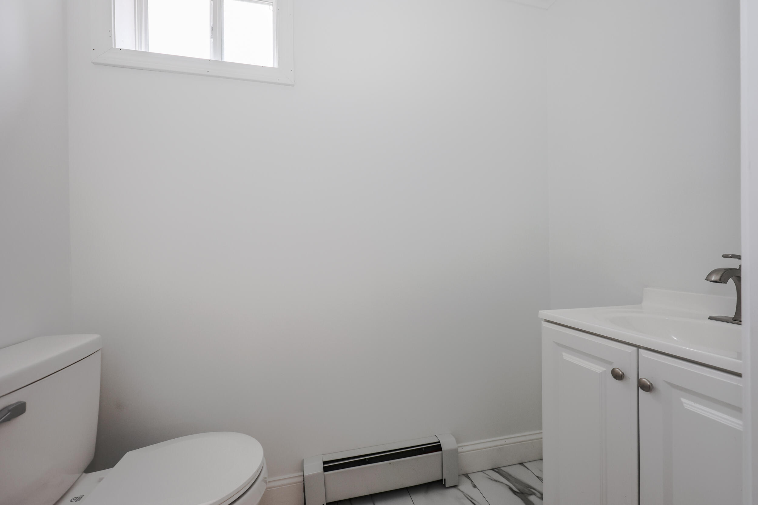 23 Lilac Lane, Unit 23 Kennebunk, ME 04043 - Photo 13 of 44 First floor 1/2 bath