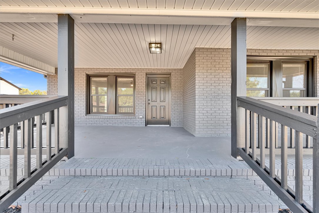801 Cherokee Road Pelzer, SC 29669 - Photo 10 of 45 This inviting porch provides a welcoming entry to the home.