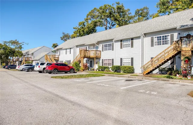 a view of a street with cars