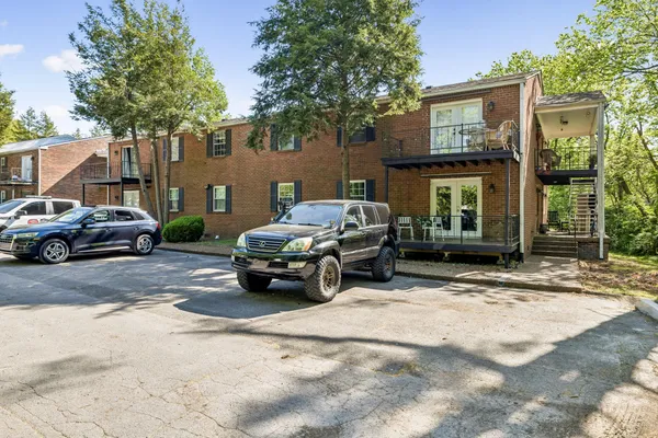 a view of a balcony with chairs