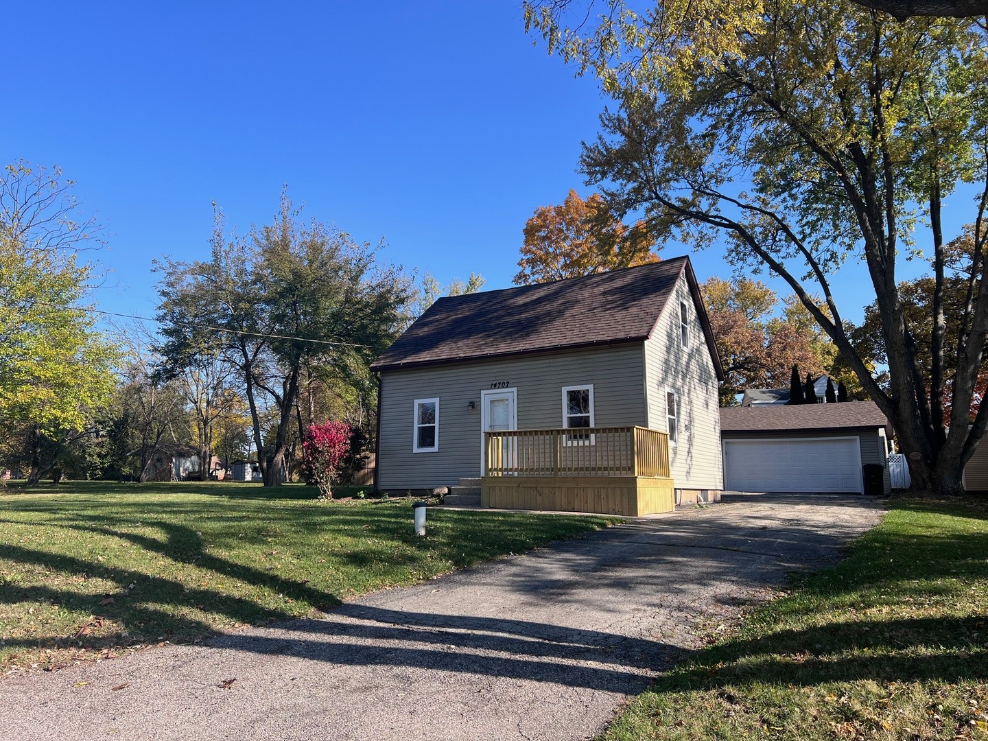 14707 Caledonia Road Caledonia, IL 61011 - Photo 2 of 37 a front view of a house with a yard