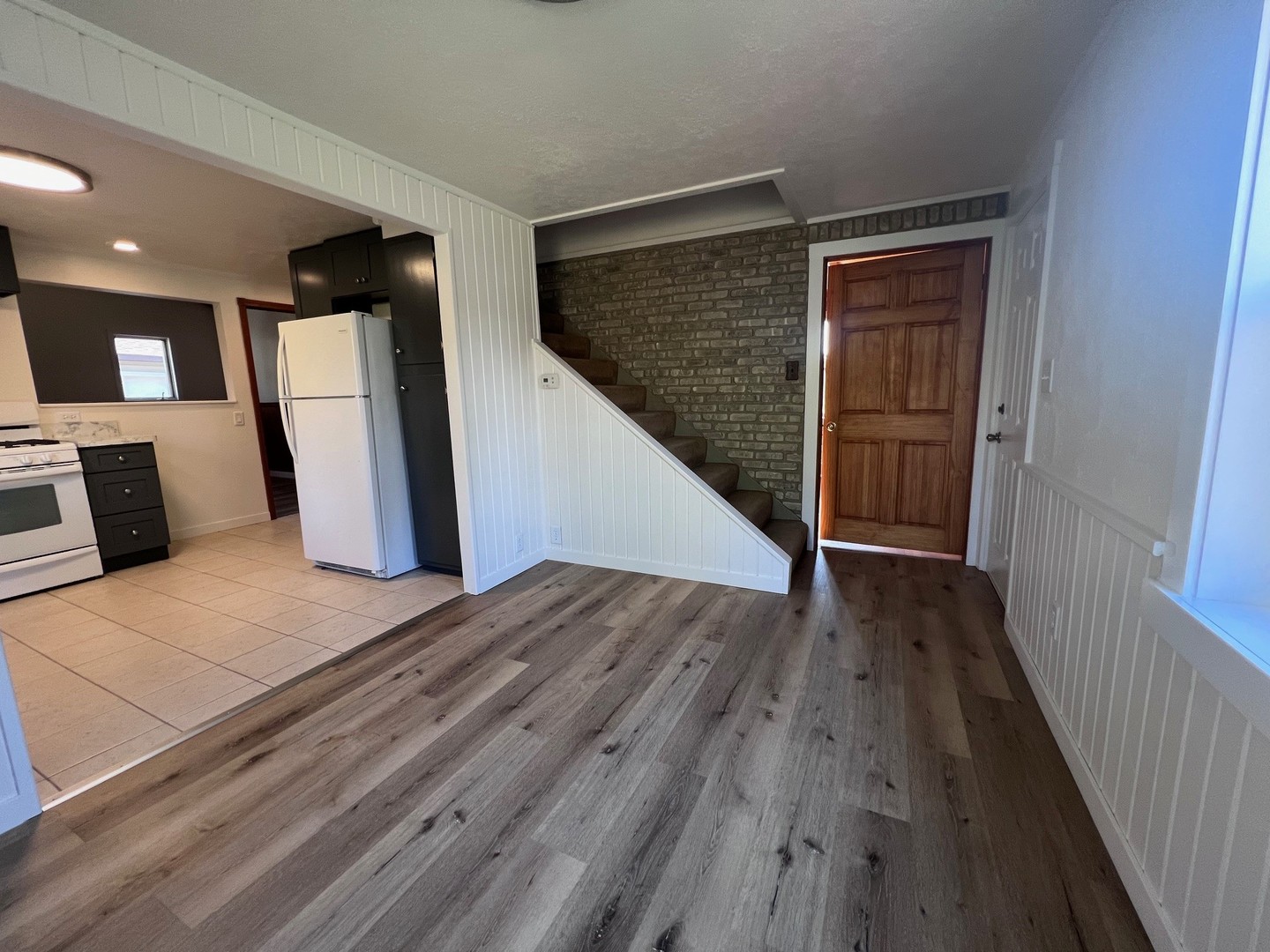 14707 Caledonia Road Caledonia, IL 61011 - Photo 25 of 37 a view of a hallway with wooden floor and staircase