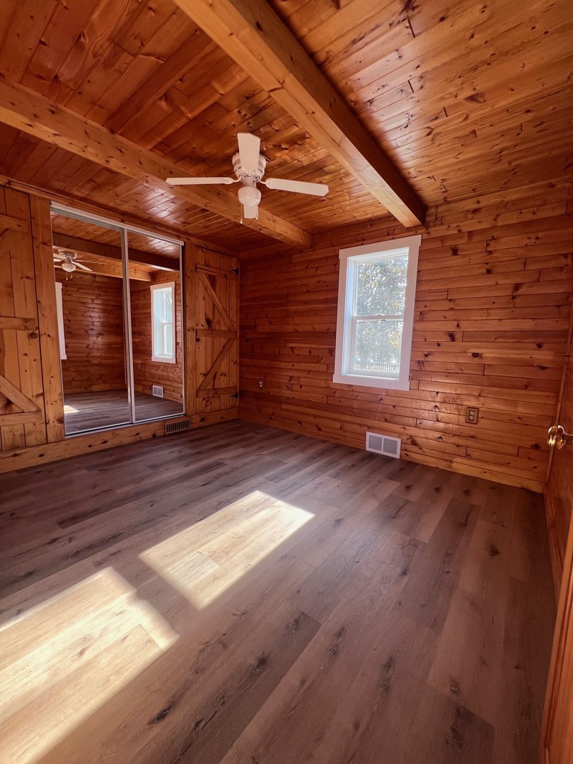 14707 Caledonia Road Caledonia, IL 61011 - Photo 26 of 37 a view of a backyard of a house