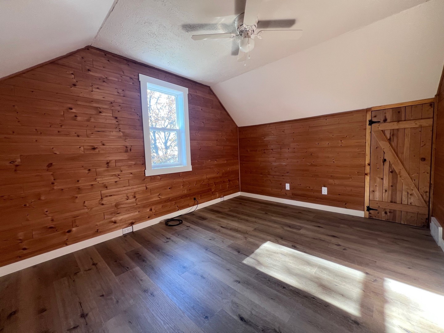14707 Caledonia Road Caledonia, IL 61011 - Photo 30 of 37 a view of an empty room with window and wooden floor