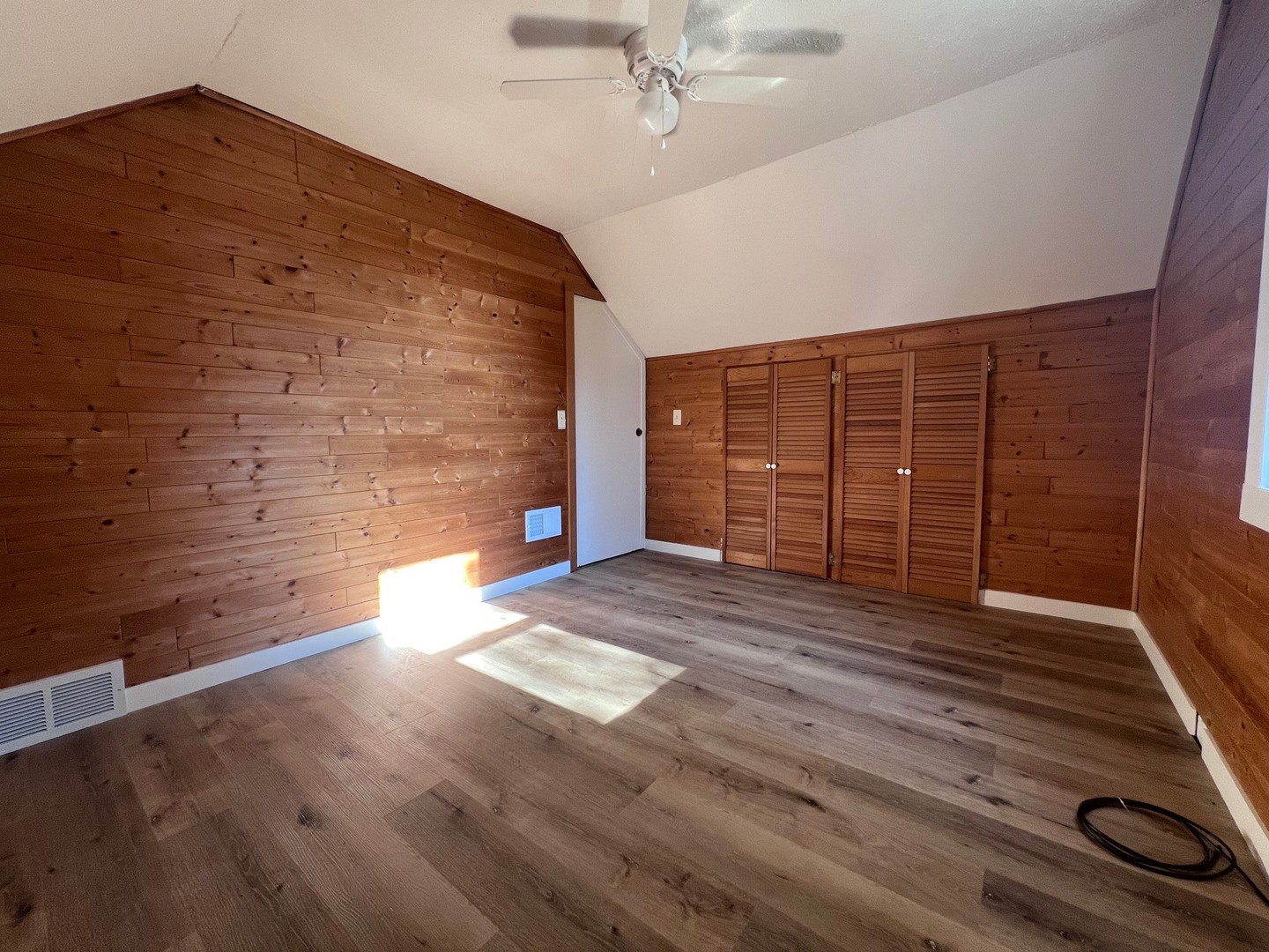 14707 Caledonia Road Caledonia, IL 61011 - Photo 31 of 37 a view of an empty room with wooden floor