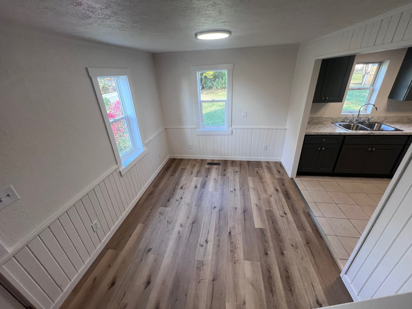 14707 Caledonia Road Caledonia, IL 61011 - Photo 35 of 37 a view of empty room with wooden floor and fan