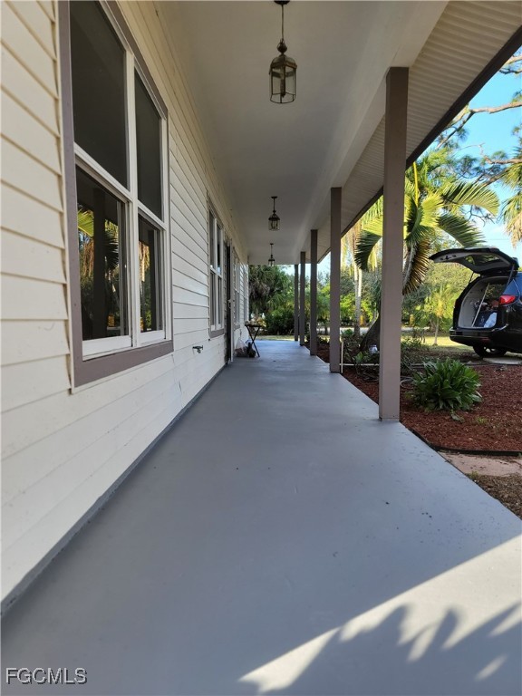 7820 Rich Road North Fort Myers, FL 33917 - Photo 13 of 26 a view of a porch
