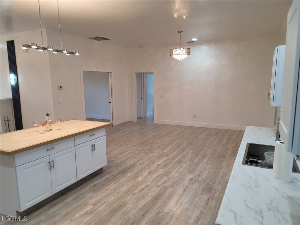 7820 Rich Road North Fort Myers, FL 33917 - Photo 16 of 26 a bathroom with a sink double vanity granite and a mirror