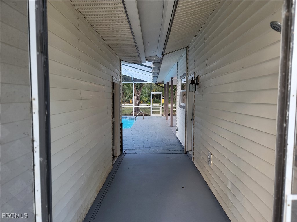 7820 Rich Road North Fort Myers, FL 33917 - Photo 18 of 26 a view of a porch