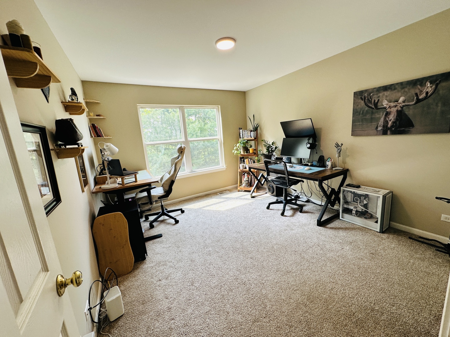 963 Oak Ridge Boulevard Elgin, IL 60120 - Photo 13 of 29 a view of a workspace with gym equipment