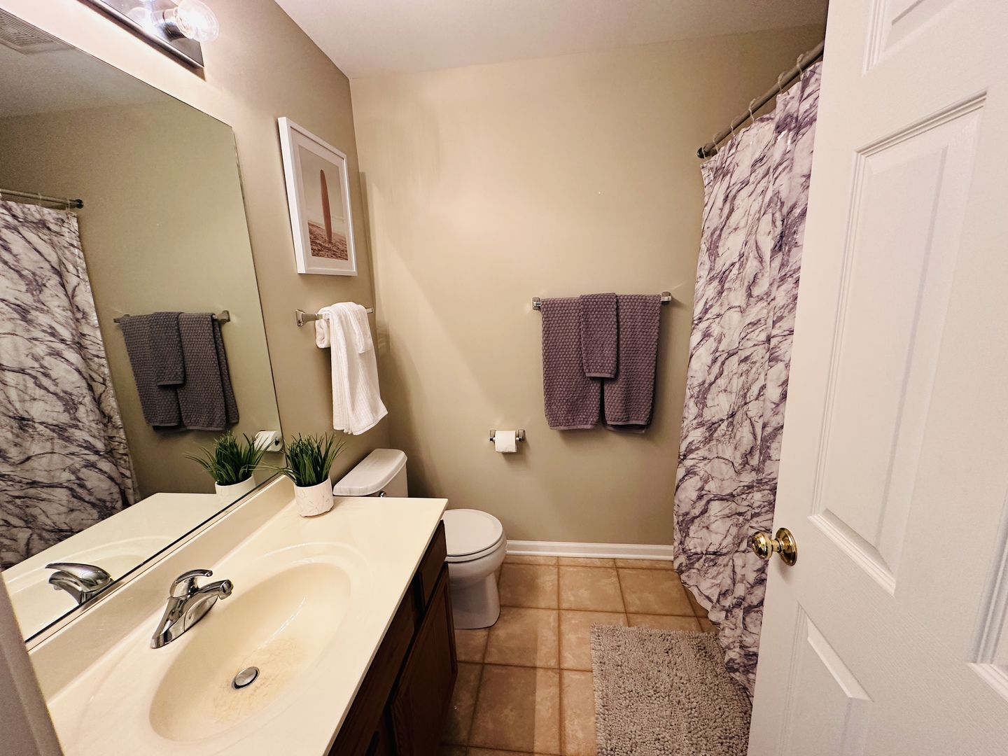 963 Oak Ridge Boulevard Elgin, IL 60120 - Photo 16 of 29 a bathroom with a sink and a mirror