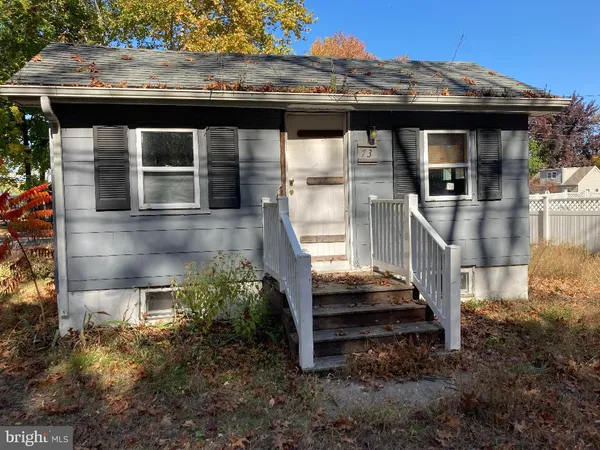 a front view of a house with a porch