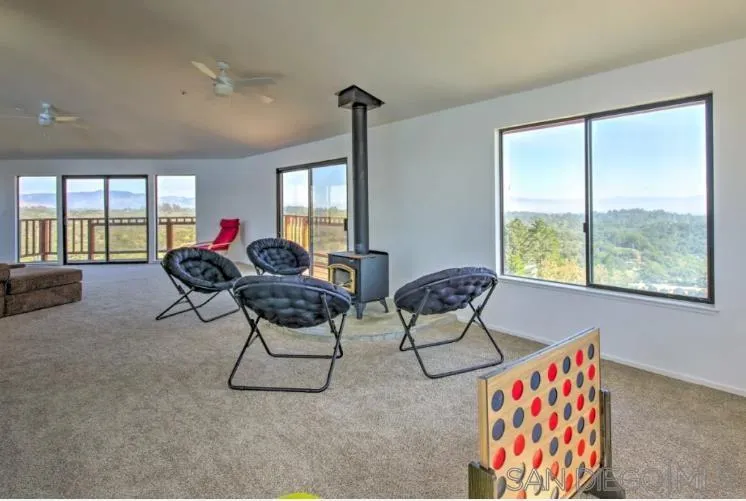 404 Hidden Valley Road Watsonville, CA 95076 - Photo 11 of 69 a living room with furniture and a window