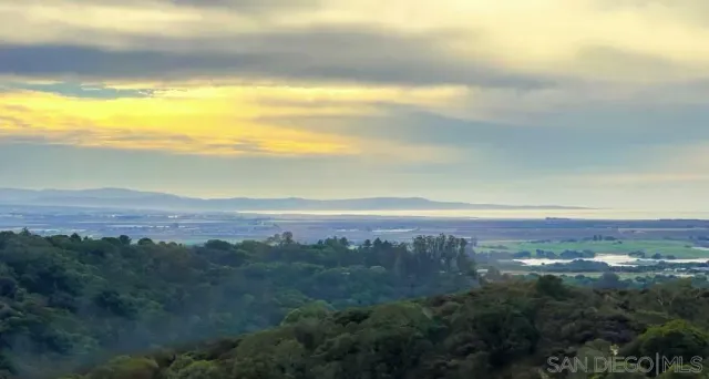 a view of lake and mountain