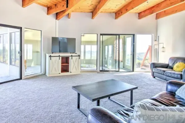 a view of a city with lush green forest