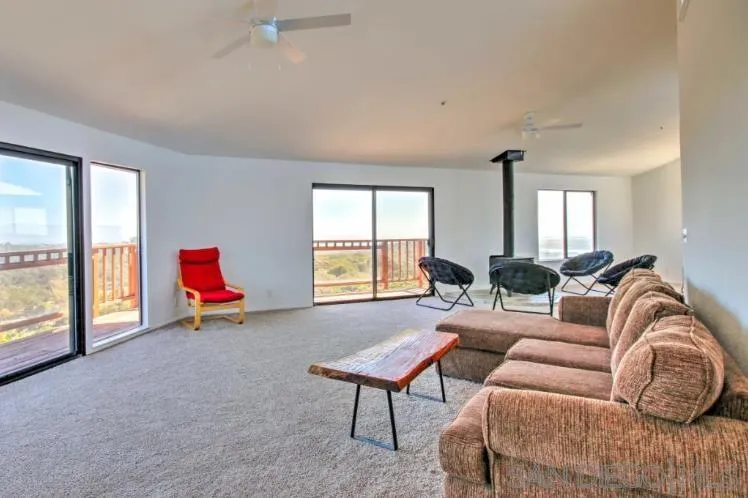 404 Hidden Valley Road Watsonville, CA 95076 - Photo 26 of 69 a living room with furniture and a large window
