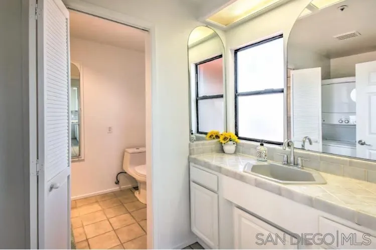 404 Hidden Valley Road Watsonville, CA 95076 - Photo 31 of 69 a bathroom with a sink toilet and shower