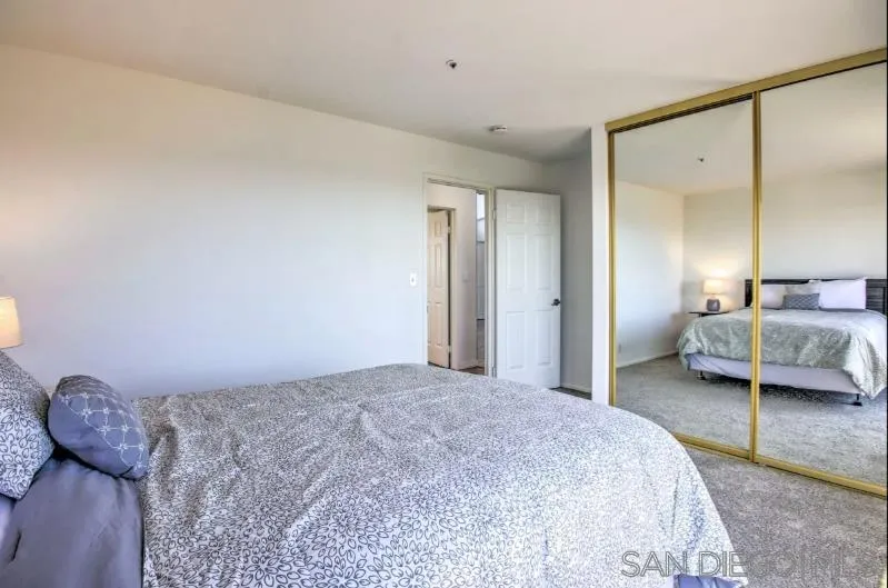 404 Hidden Valley Road Watsonville, CA 95076 - Photo 53 of 69 a bedroom with a bed and a couch