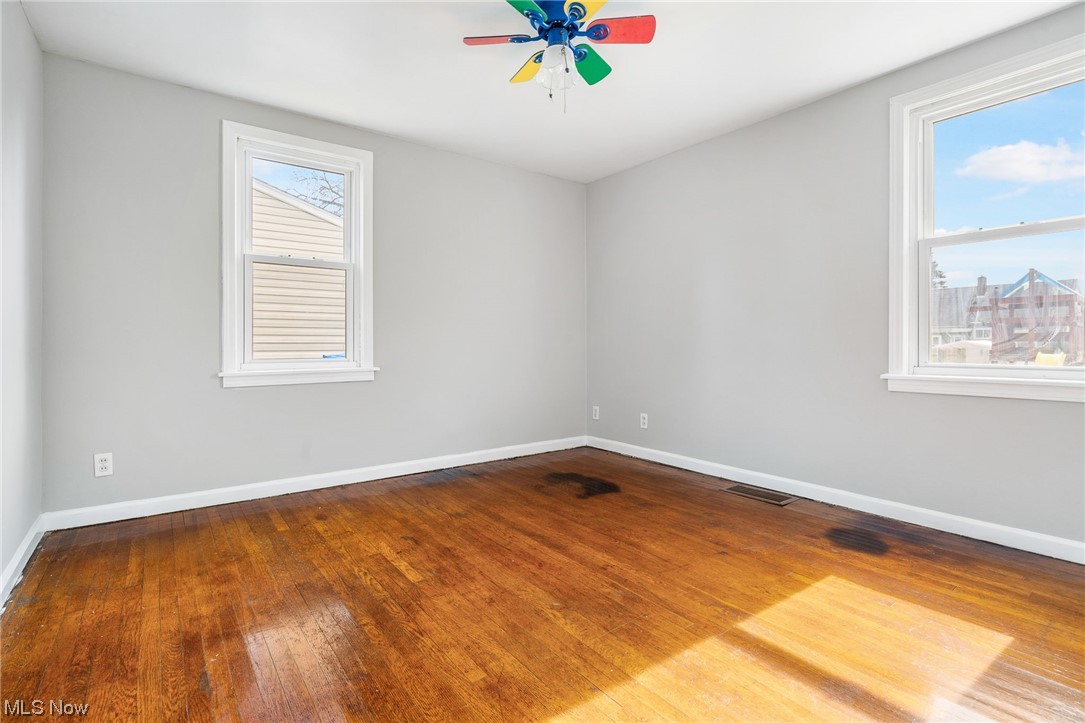 2942 17th Street Northwest Canton, OH 44708 - Photo 15 of 25 Bedroom with ceiling fan and hardwood / wood-style flooring