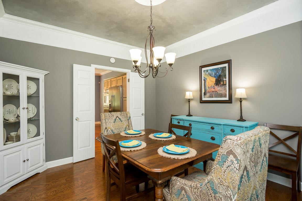 5580 Vanderbilt Road Old Hickory, TN 37138 - Photo 8 of 28 a view of a dining room with furniture and wooden floor
