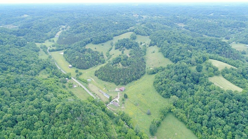 6431 Old Bottom Road Pleasant Shade, TN 37145 - Photo 2 of 38 an aerial view of a house with a yard