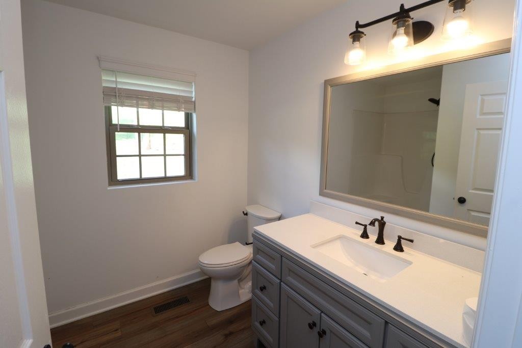 6431 Old Bottom Road Pleasant Shade, TN 37145 - Photo 13 of 38 a bathroom with a sink and a toilet