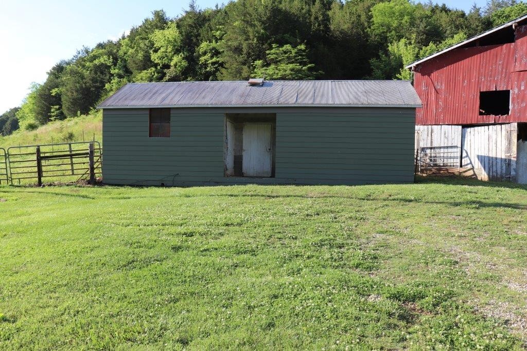 6431 Old Bottom Road Pleasant Shade, TN 37145 - Photo 20 of 38 a view of a backyard of the house