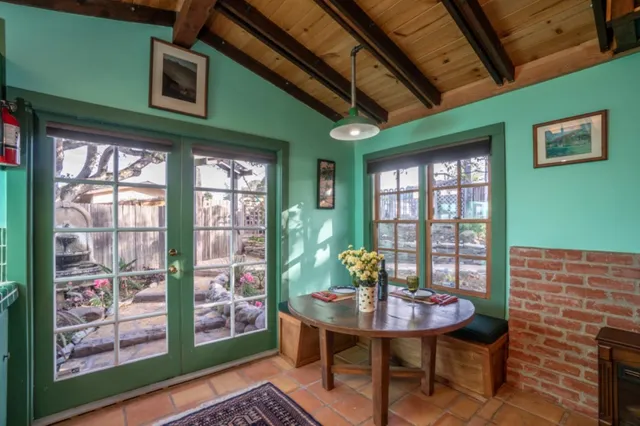 a view of a door and a window